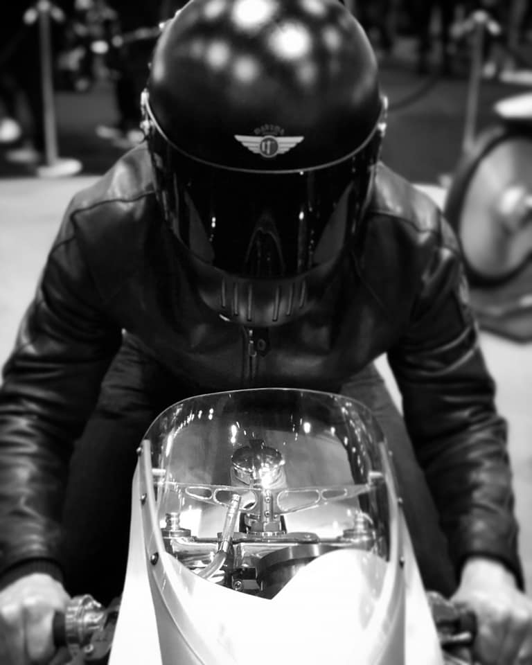 S-T-O-R-I-K-bike-builder-Laurent-Amman-trying-out-Davida-Koura-helmet