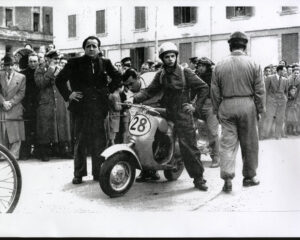 Giuseppe Cau riding the Vespa Circuito 125 in 1949.