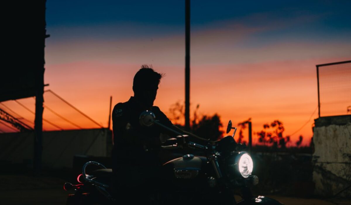 male-rider-on-triumoh-motorcycle-light-dawn