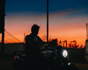 male-rider-on-triumoh-motorcycle-light-dawn