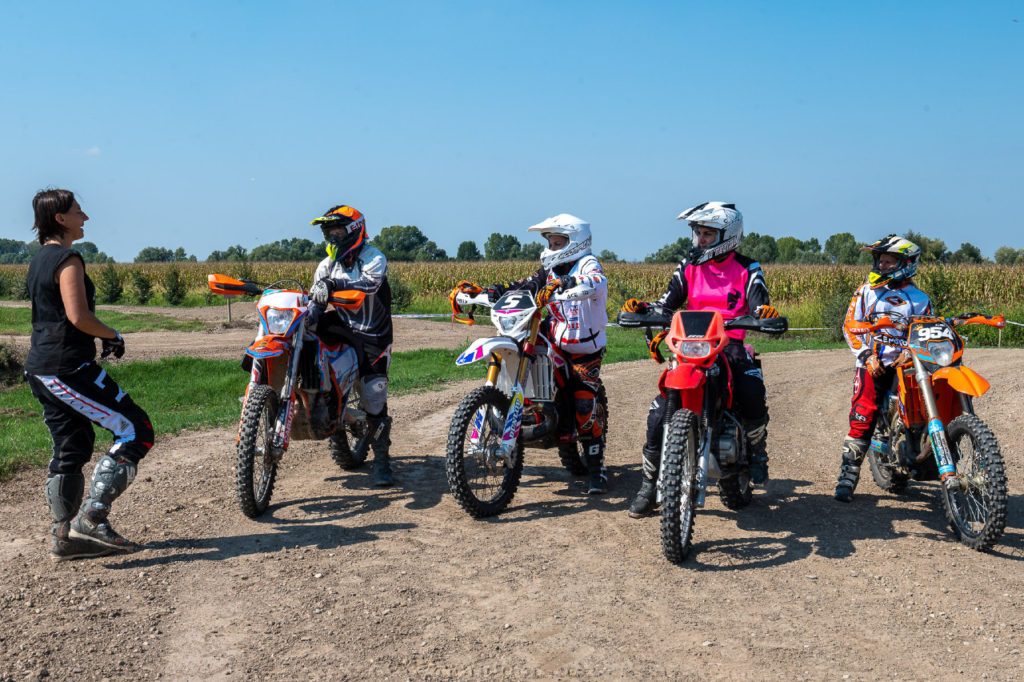flattrack-women-racers-with-instructor-photo-by-andrea-caiola-courtesy-wmbootcamp
