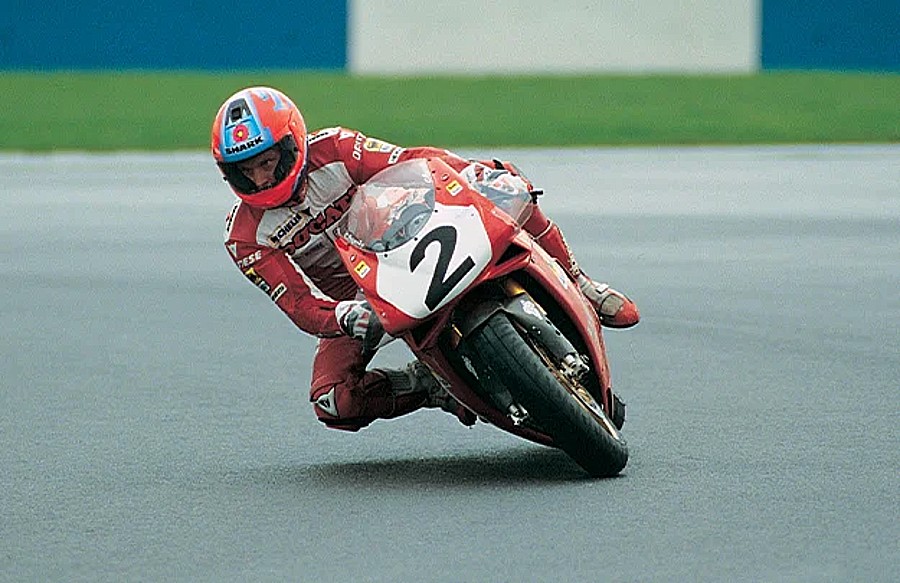 Carl Fogarty riding the Ducati 916 F94 factory race bike number 2.