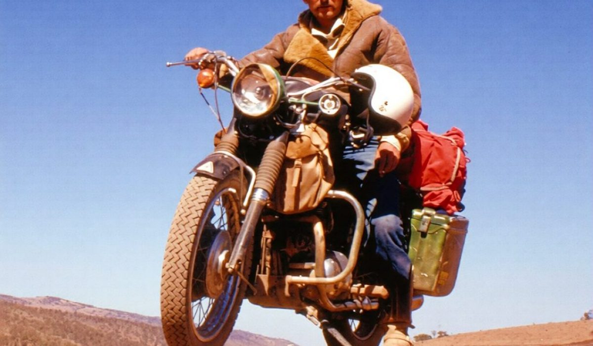 Ted Simon in the desert, on his Triumph Tiger 100 motorcycle.