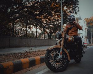 royal-enfield-classic-bike-man-ride-5919885/